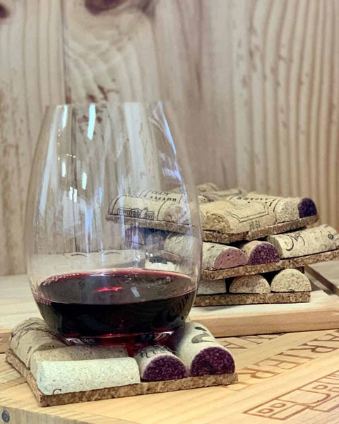 wine glass on coaster made of wine corks