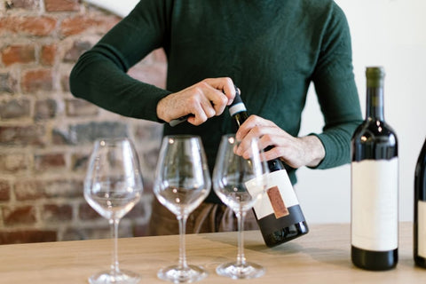 how to open a bottle of wine without a corkscrew